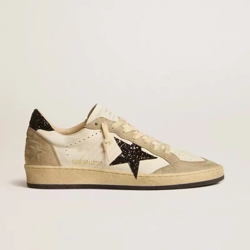 White cowhide and black sparkling star